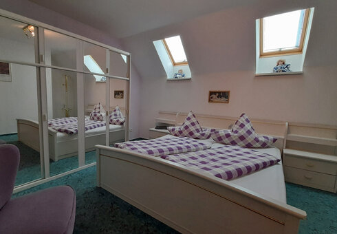 Ferienwohnung - Schlafzimmer