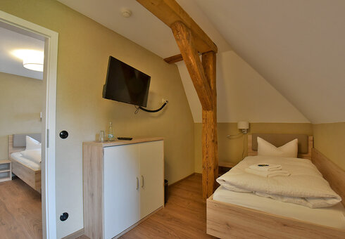 Blick in ein Dreibettzimmer