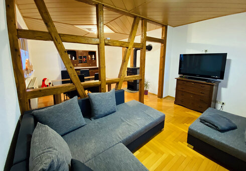 Wohnzimmer mit Essbereich &  Kamin