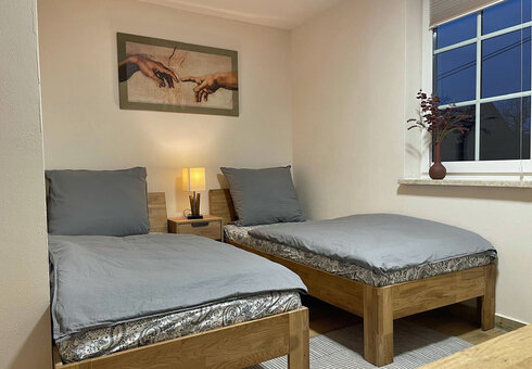 Schlafzimmer mit 2 Einzelbetten