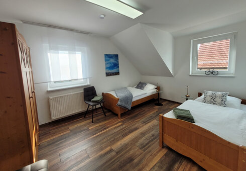 Blick in das Schlafzimmer mit 2 Einzelbetten
