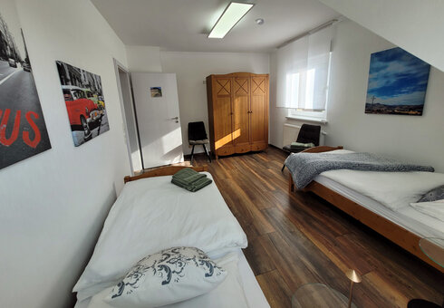 Blick in das Schlafzimmer mit 2 Einzelbetten