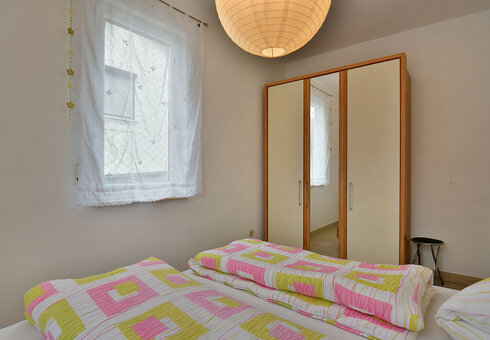 Schlafzimmer mit Doppelbett