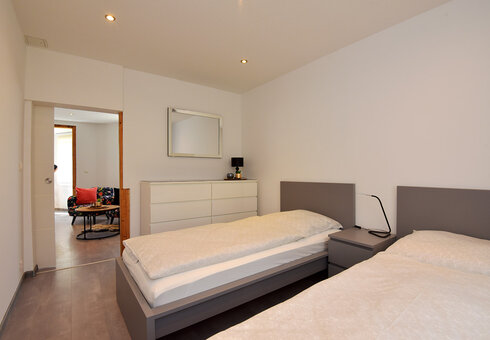 Schlafzimmer 1 mit getrennten Betten