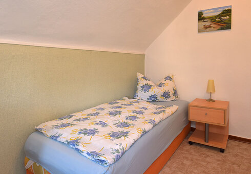Schlafzimmer mit Einzelbett