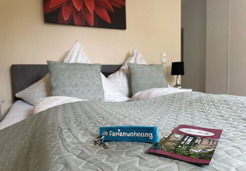Schlüssel und Flyer