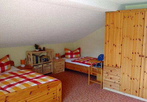 Blick in das Schlafzimmer 1