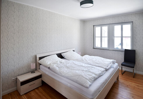 Schlafzimmer mit Doppelbett