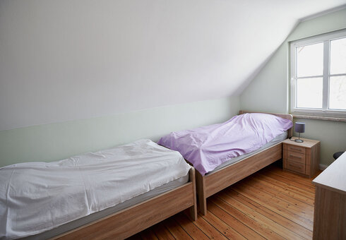 Schlafzimmer mit Einzelbetten