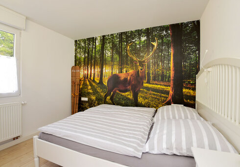 Schlafzimmer mit Doppelbett