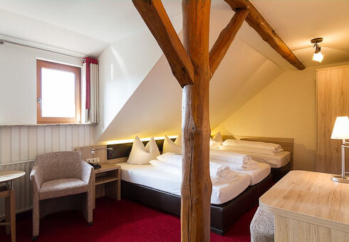 Blick in ein Dreibettzimmer