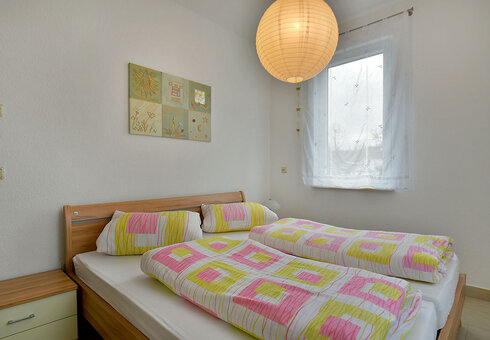 Schlafzimmer mit Doppelbett