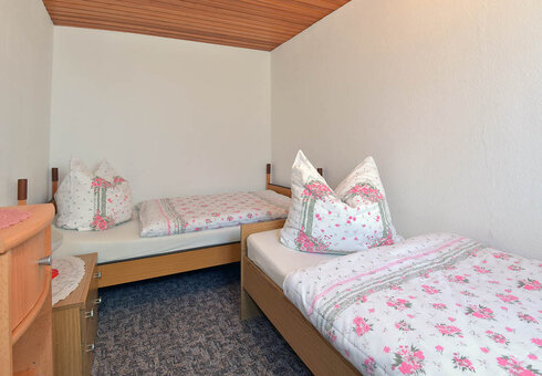 Schlafzimmer mit Einzelbetten