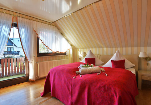 Schlafbereich mit Doppelbett