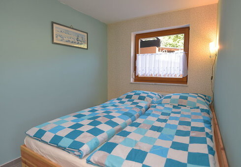 Schlafzimmer mit Doppelbett