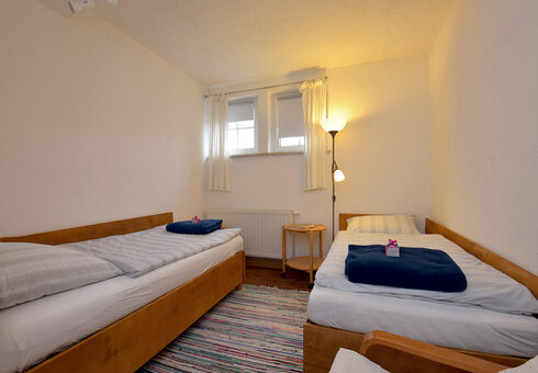 Blick in das Schlafzimmer mit 2 Einzelbetten