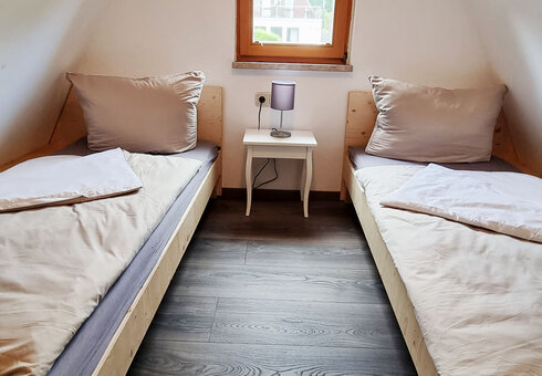 Schlafzimmer mit Einzelbetten